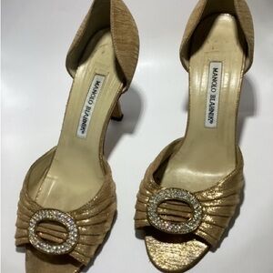 Manolo Blahnik gold open toe fabric heel.